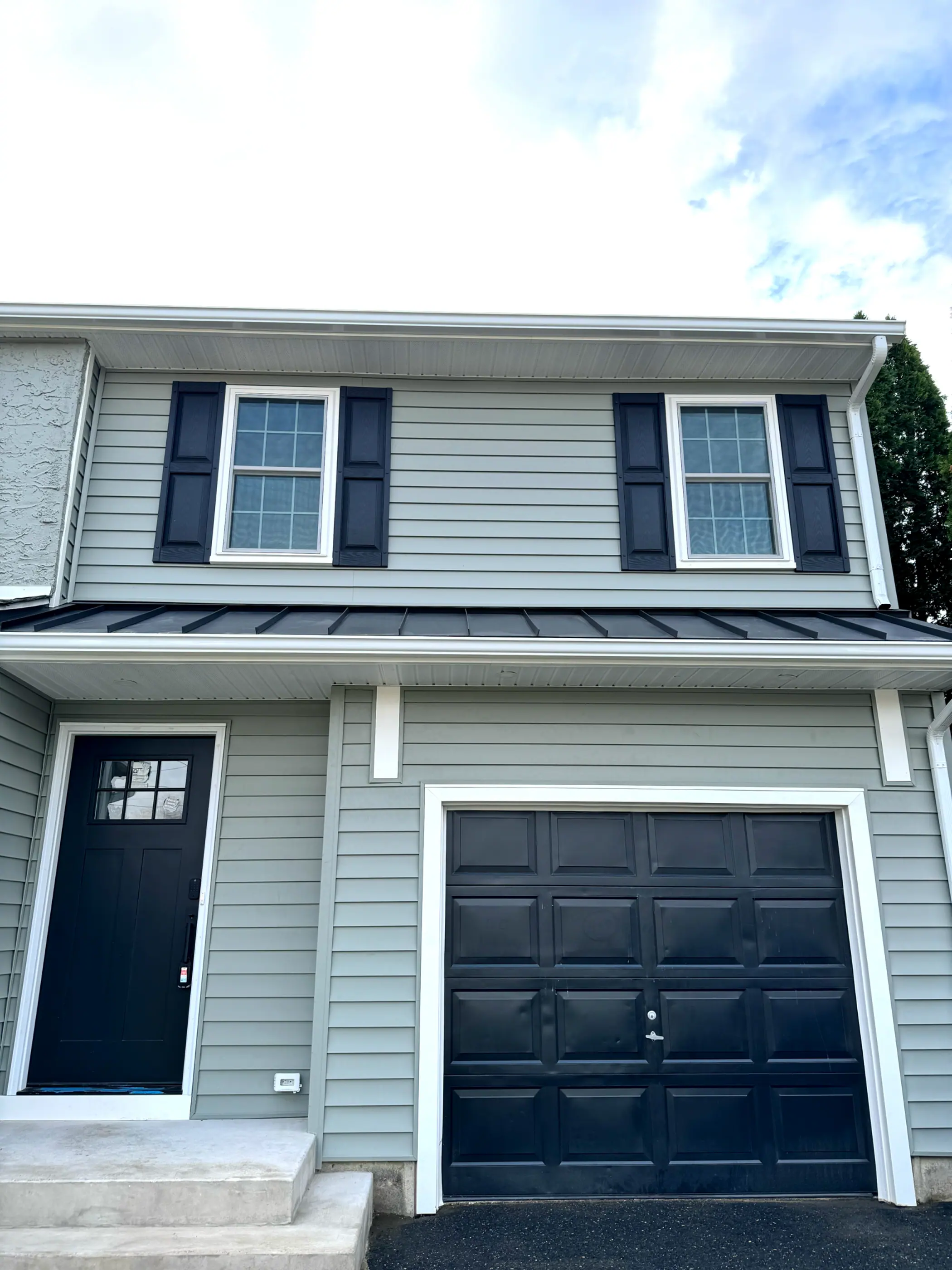 Garage with a second floor addition above