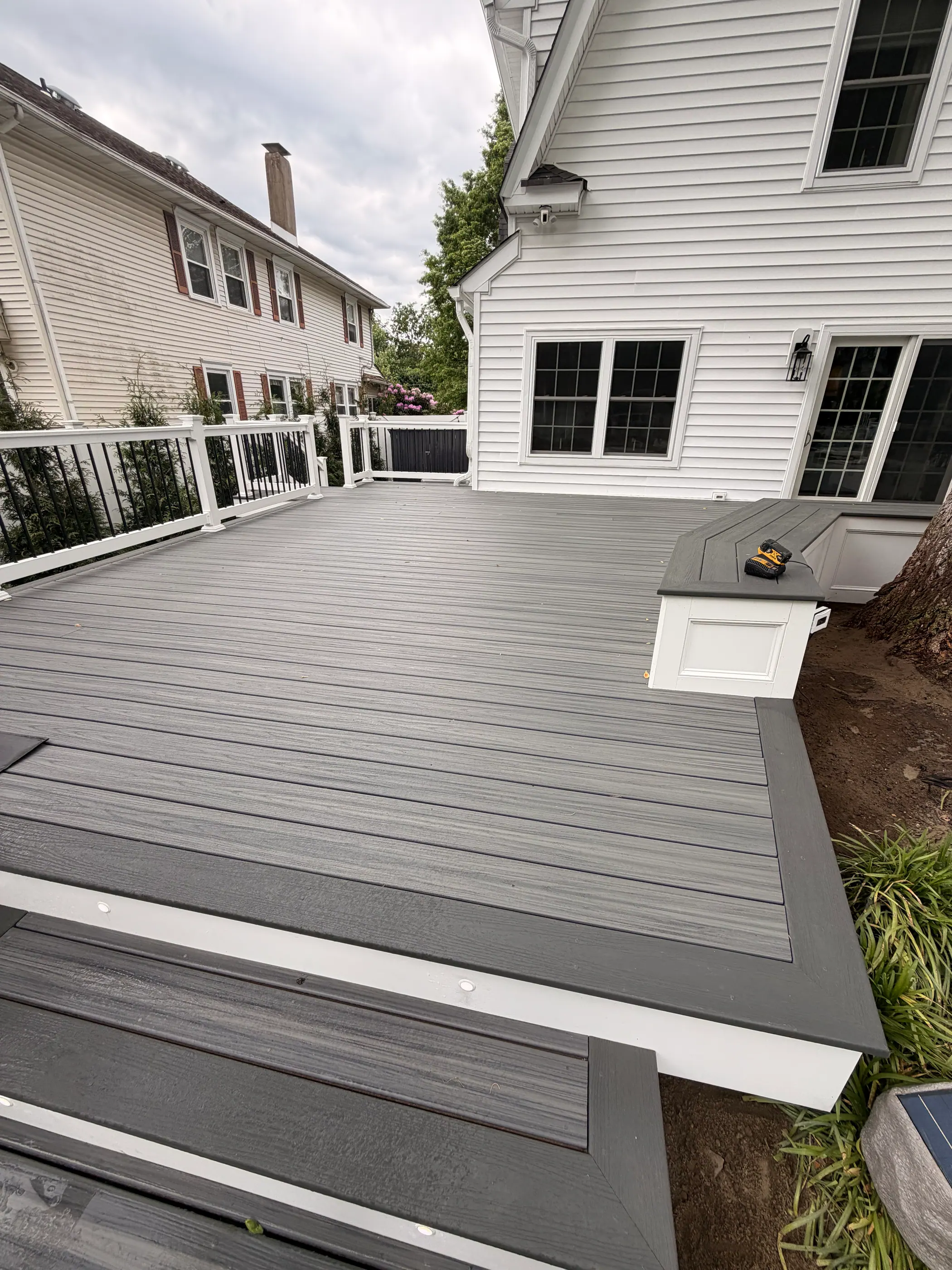 Large composite deck with railing and stairs