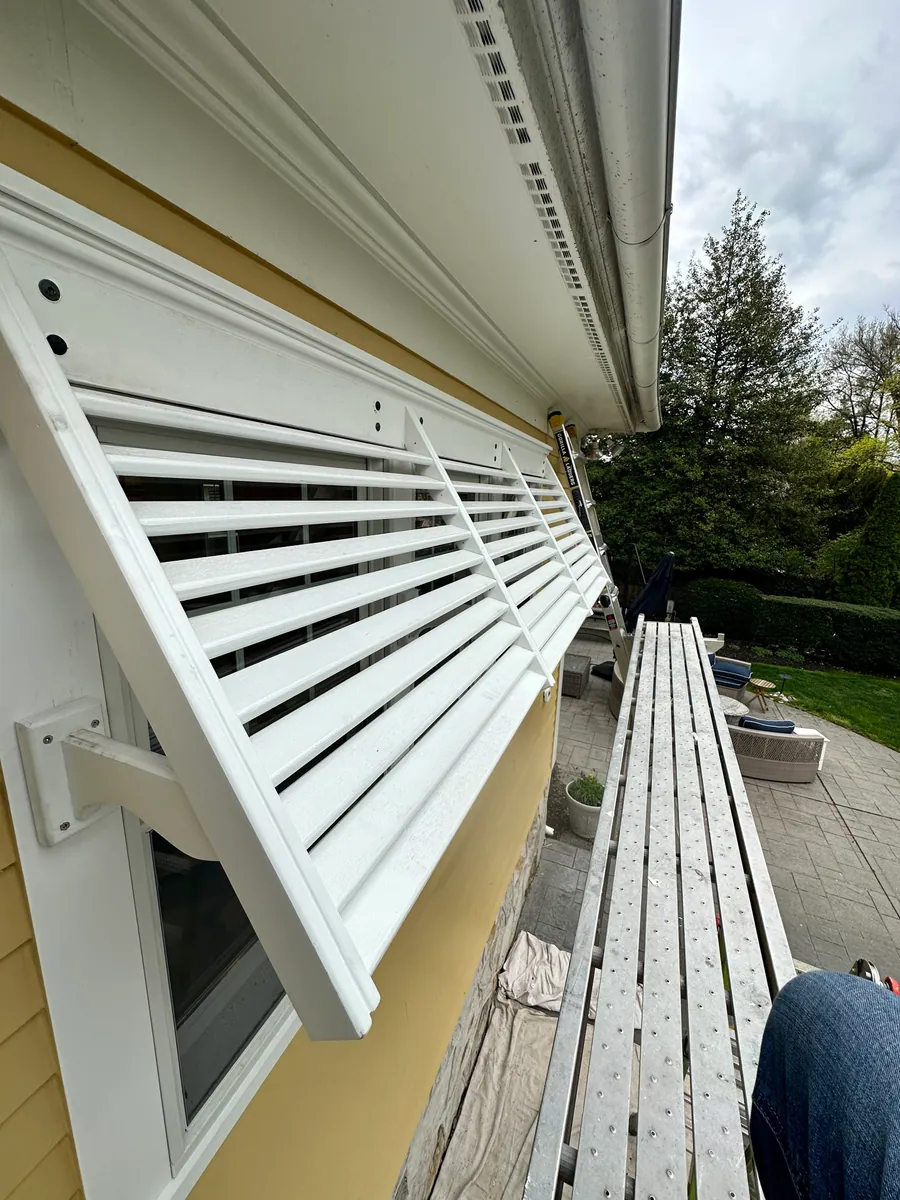 Louvered shutters stacked before installation