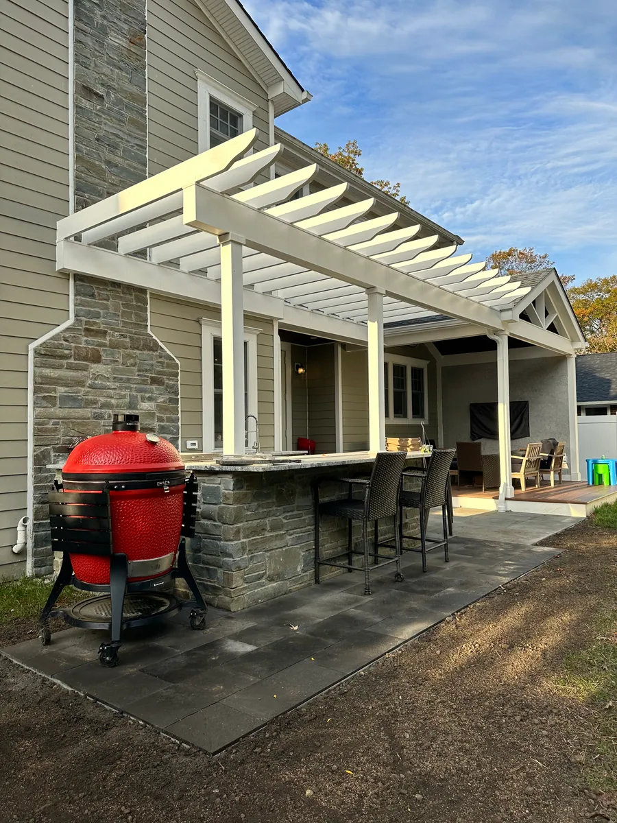 Pergola over an outdoor kitchen and patio