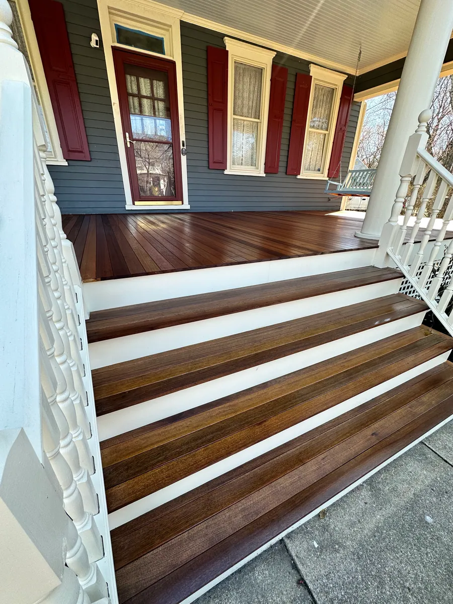Porch steps with painted risers and stone treads