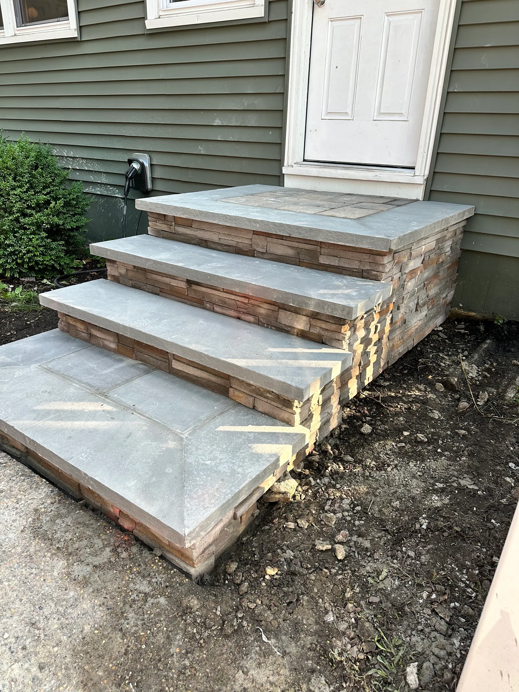 Stone steps leading to a garden path