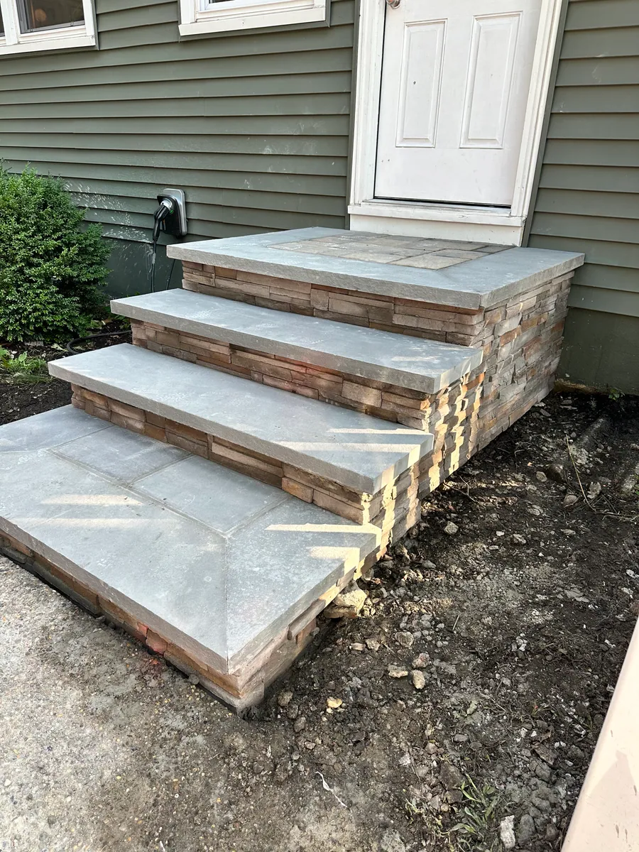 Stone steps leading to a garden path