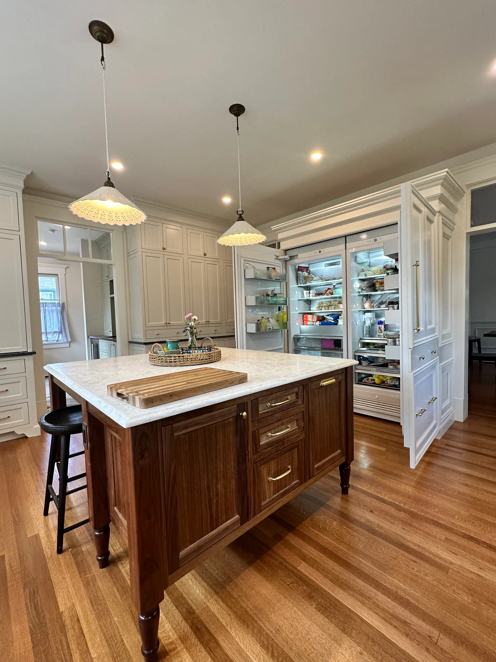 Kitchen with a full wall of pantry cabinetry