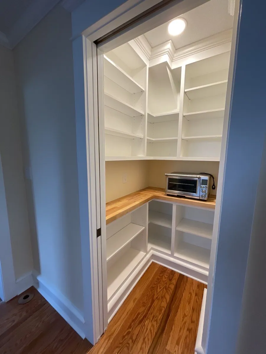 Built in pantry cabinetry with adjustable shelves