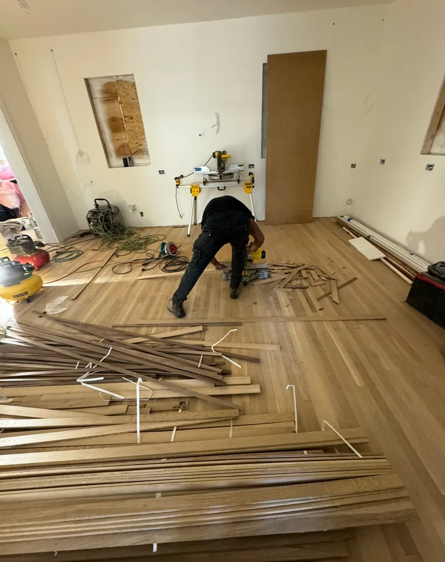 Hardwood flooring being laid