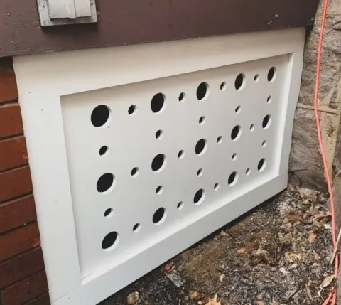 Painted panel with circular cutouts