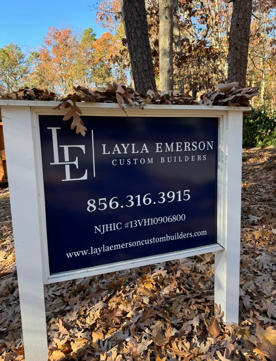 Layla Emerson Custom Builders yard sign at a job site